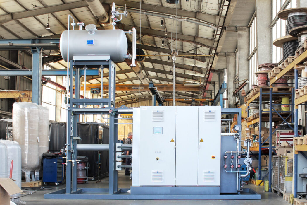 150 kW, 280 °C electric heater with large cooler and expansion tank mounted on the plant frame